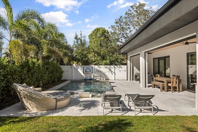 view of swimming pool featuring a patio area, a fenced in pool, and a fenced backyard