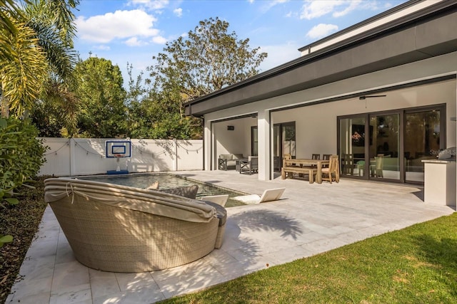 view of patio with an outdoor hangout area and a fenced backyard