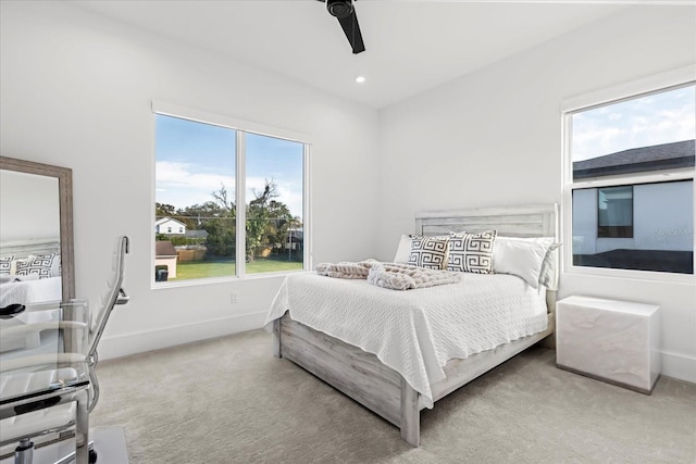 carpeted bedroom featuring recessed lighting, baseboards, and ceiling fan