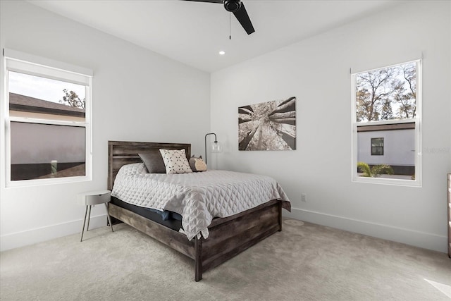 carpeted bedroom with recessed lighting, baseboards, multiple windows, and ceiling fan