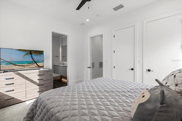 bedroom with recessed lighting, visible vents, ensuite bathroom, and ceiling fan