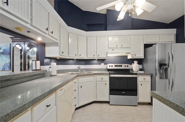 kitchen featuring a ceiling fan, under cabinet range hood, a sink, appliances with stainless steel finishes, and light tile patterned floors