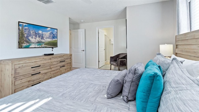 bedroom with visible vents