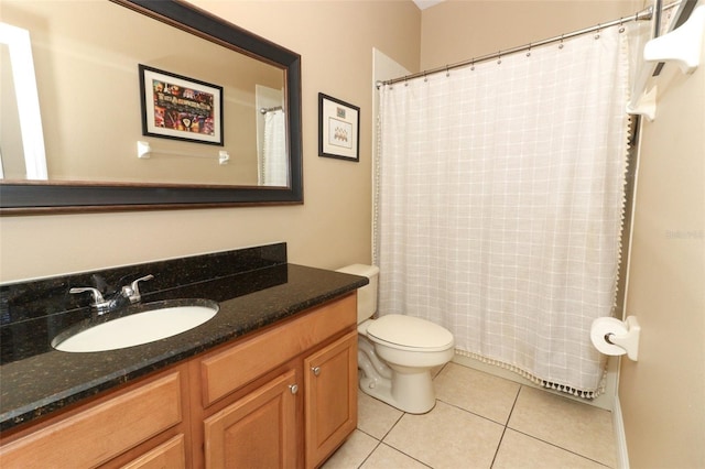 bathroom featuring tile patterned flooring, curtained shower, toilet, and vanity