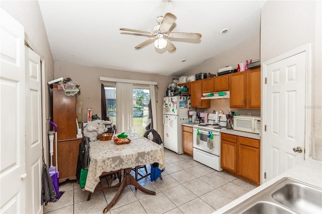 kitchen featuring under cabinet range hood, white appliances, light countertops, and brown cabinetry