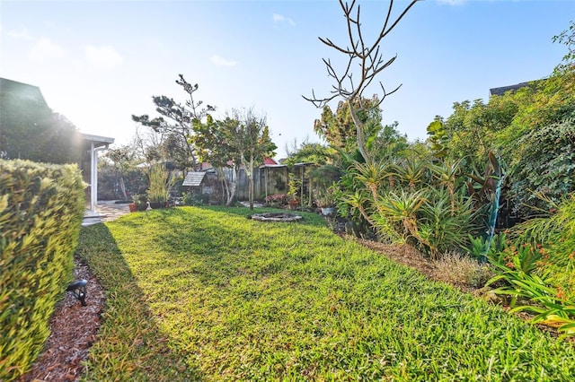 view of yard featuring fence