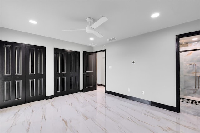 unfurnished bedroom with visible vents, multiple closets, recessed lighting, baseboards, and ceiling fan