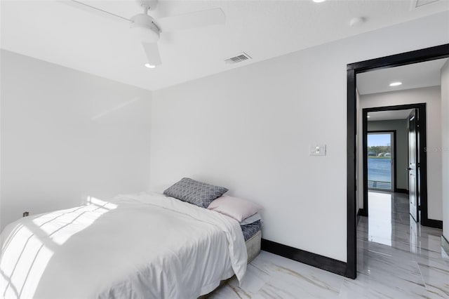 bedroom featuring baseboards, visible vents, marble finish floor, and ceiling fan