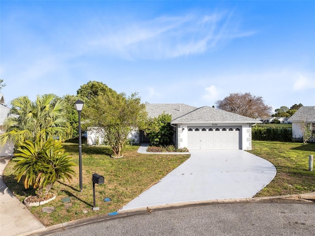 view of front of house with an attached garage, stucco siding, a shingled roof, a front lawn, and concrete driveway