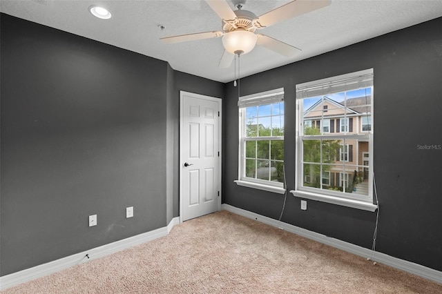 1341 Mill Stream Ln, Winter Springs, FL 32708 - carpeted empty room with a ceiling fan, baseboards, and a textured ceiling