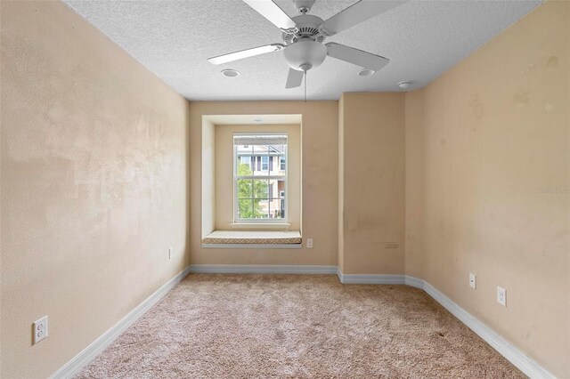 1341 Mill Stream Ln, Winter Springs, FL 32708 - spare room with carpet flooring, a ceiling fan, baseboards, and a textured ceiling