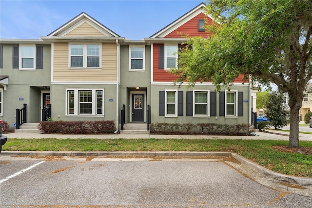 1341 Mill Stream Ln, Winter Springs, FL 32708 - multi unit property featuring stucco siding and uncovered parking