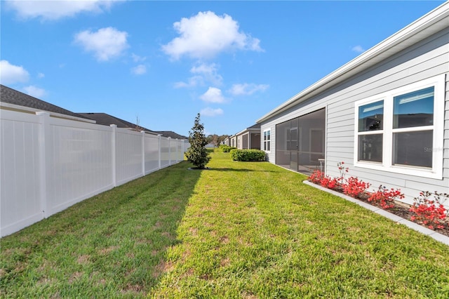 view of yard with fence