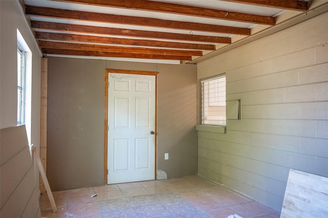 interior space with beamed ceiling