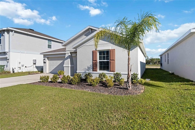 view of front of house with concrete driveway, a garage, a front yard, and stucco siding