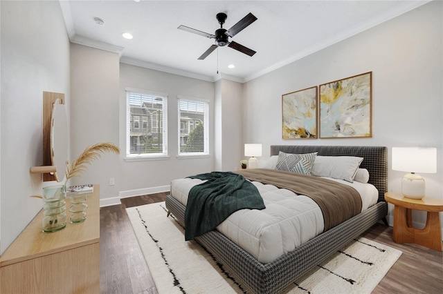 bedroom featuring recessed lighting, baseboards, wood finished floors, and ornamental molding