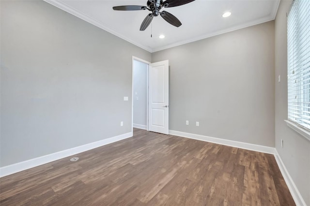 spare room with baseboards, recessed lighting, ceiling fan, dark wood-type flooring, and crown molding