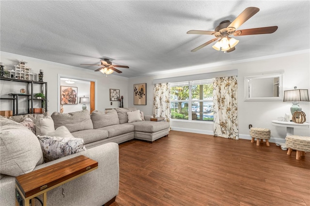 living room featuring crown molding, baseboards, wood finished floors, a textured ceiling, and a ceiling fan