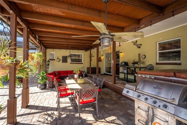 view of patio with an outdoor hangout area, outdoor dining area, area for grilling, a grill, and a ceiling fan