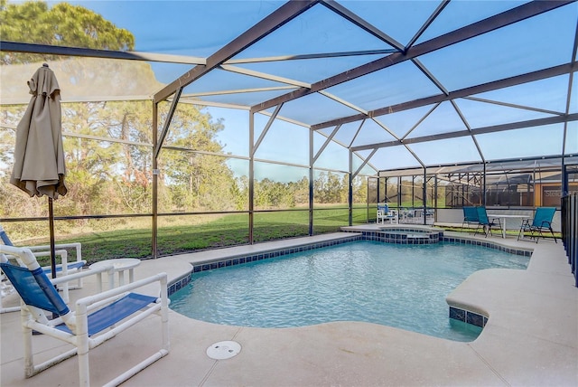 1028 Orange Cosmos Blvd, Davenport, FL 33837 - view of swimming pool featuring a pool with connected hot tub, a patio, and a lanai