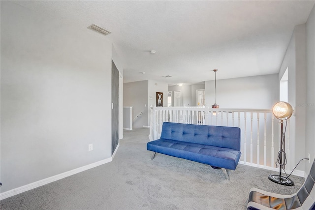 1028 Orange Cosmos Blvd, Davenport, FL 33837 - sitting room featuring carpet and an upstairs landing