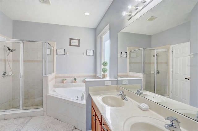 1028 Orange Cosmos Blvd, Davenport, FL 33837 - bathroom with a shower stall, a bath, tile patterned floors, and double vanity