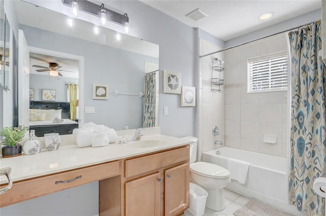 1028 Orange Cosmos Blvd, Davenport, FL 33837 - bathroom featuring tile patterned flooring, vanity, shower / bath combo with shower curtain, ensuite bath, and ceiling fan