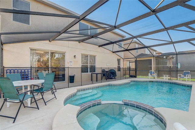 1028 Orange Cosmos Blvd, Davenport, FL 33837 - view of swimming pool with a pool with connected hot tub, a patio, and a lanai