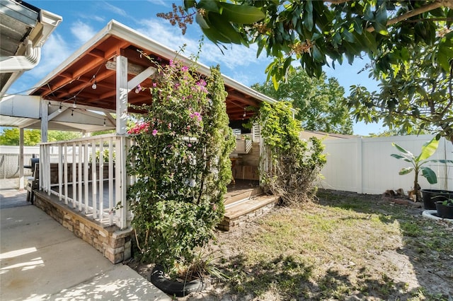 view of side of property with a fenced backyard