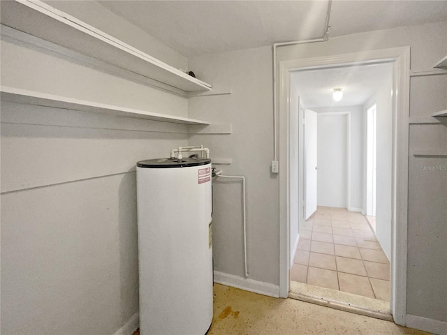 laundry area featuring water heater