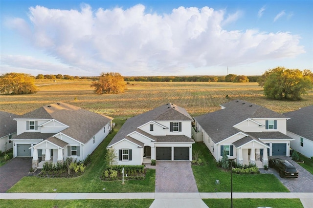 birds eye view of property featuring a rural view