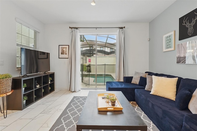 living room featuring marble finish floor