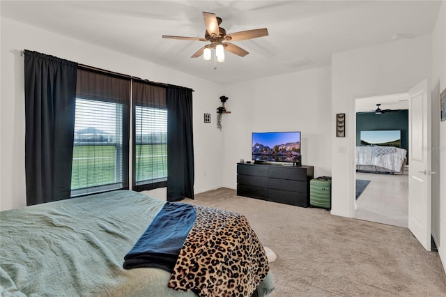 bedroom featuring ceiling fan and carpet floors