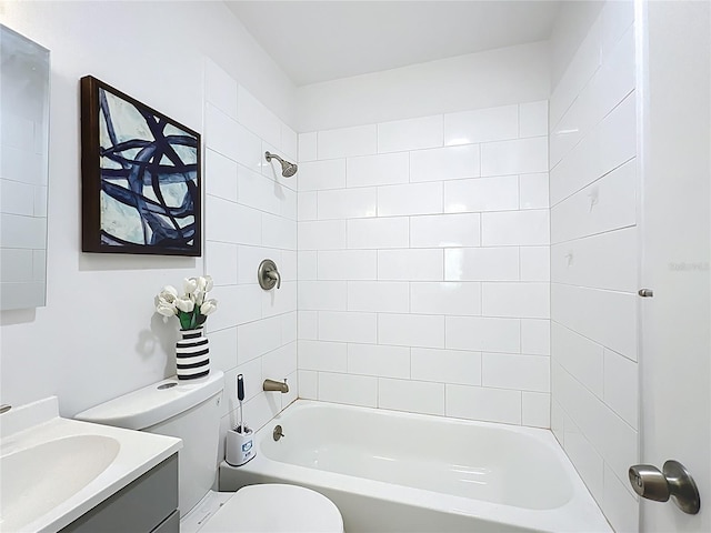 bathroom with vanity, toilet, and shower / bathtub combination