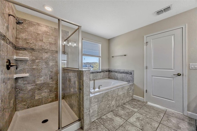 full bath with a bath, visible vents, tile patterned floors, and a stall shower