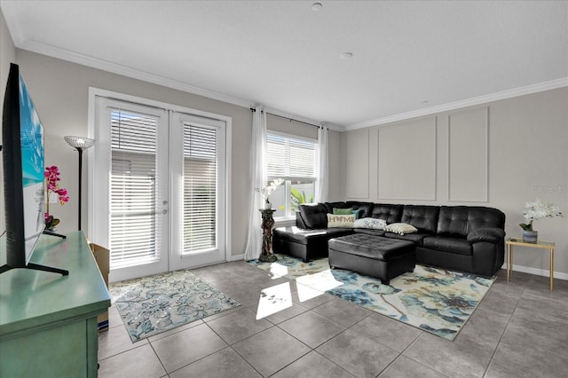 living area featuring light tile patterned floors, french doors, baseboards, and ornamental molding