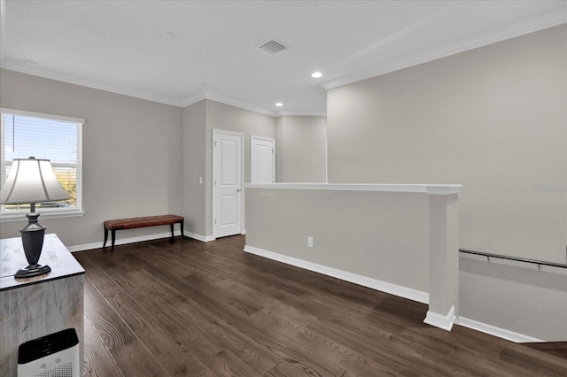 interior space with visible vents, crown molding, baseboards, recessed lighting, and dark wood-style flooring