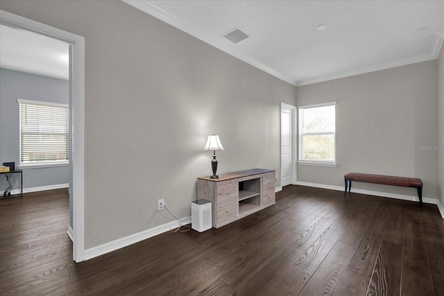 interior space with visible vents, dark wood-type flooring, and baseboards