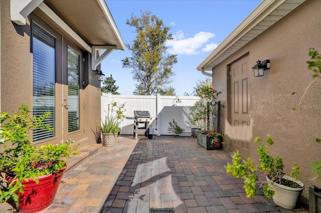 view of patio with fence