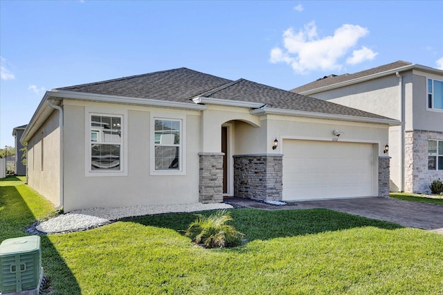 view of front facade with stucco siding, decorative driveway, an attached garage, and a shingled roof