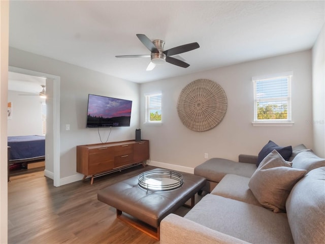 753 Daybreak Pl, Longwood, FL 32750 - living room featuring wood finished floors, baseboards, and ceiling fan