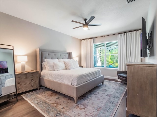 753 Daybreak Pl, Longwood, FL 32750 - bedroom featuring baseboards, wood finished floors, and a ceiling fan
