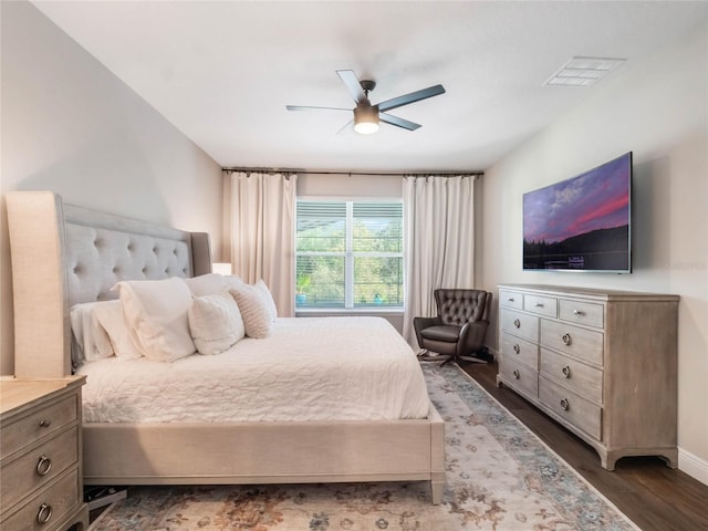753 Daybreak Pl, Longwood, FL 32750 - bedroom with dark wood-type flooring, a ceiling fan, visible vents, and baseboards
