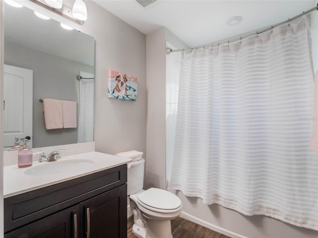 753 Daybreak Pl, Longwood, FL 32750 - bathroom featuring visible vents, shower / tub combo with curtain, toilet, wood finished floors, and vanity