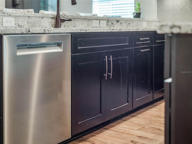 753 Daybreak Pl, Longwood, FL 32750 - kitchen with dishwasher, light countertops, and light wood finished floors