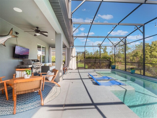 753 Daybreak Pl, Longwood, FL 32750 - view of swimming pool featuring grilling area, glass enclosure, outdoor lounge area, a patio area, and a ceiling fan