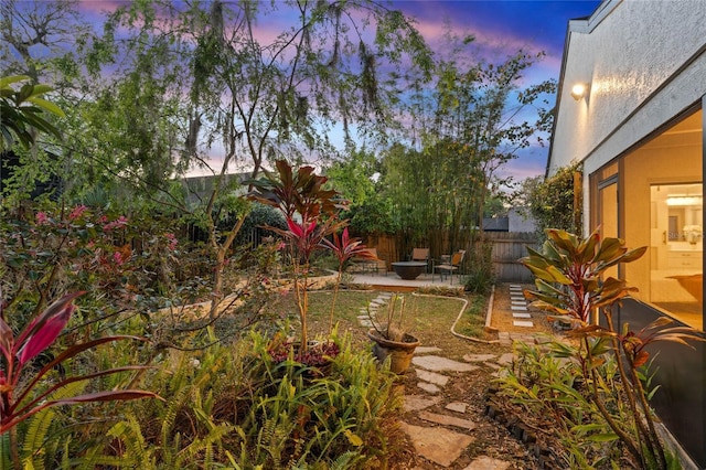 view of yard with a patio and fence