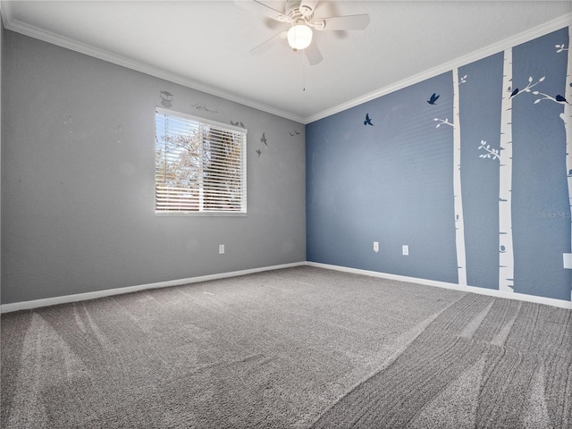 empty room featuring carpet flooring, baseboards, ceiling fan, and ornamental molding