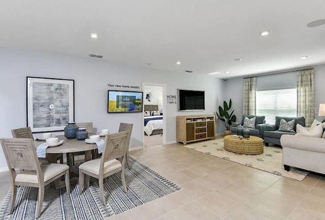 dining space with light tile patterned floors, visible vents, recessed lighting, and baseboards