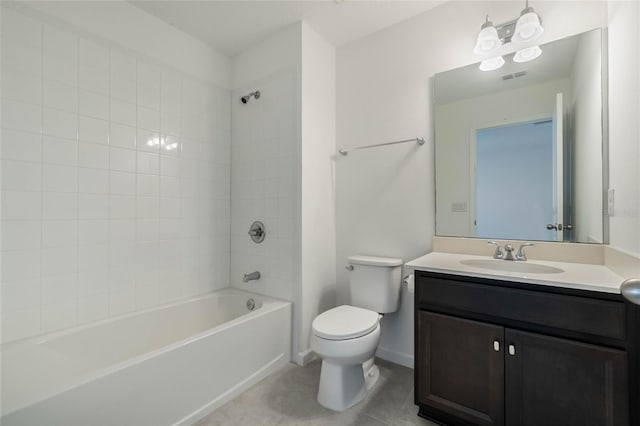 bathroom featuring tile patterned floors, visible vents, toilet, washtub / shower combination, and vanity